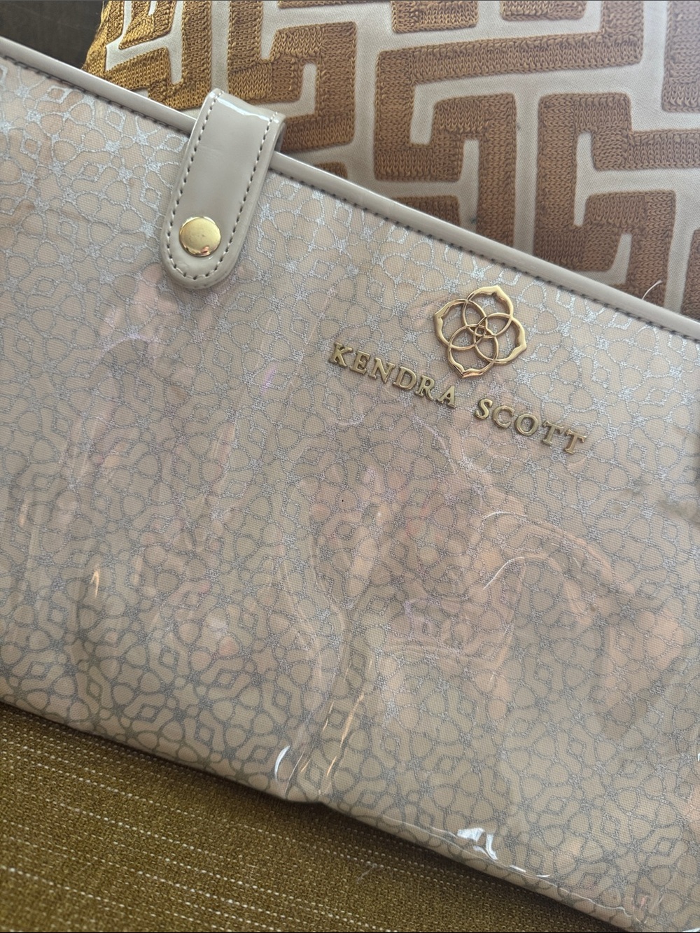 Kendra Scott Pale Cream jewelry travel bag with Gold Logo